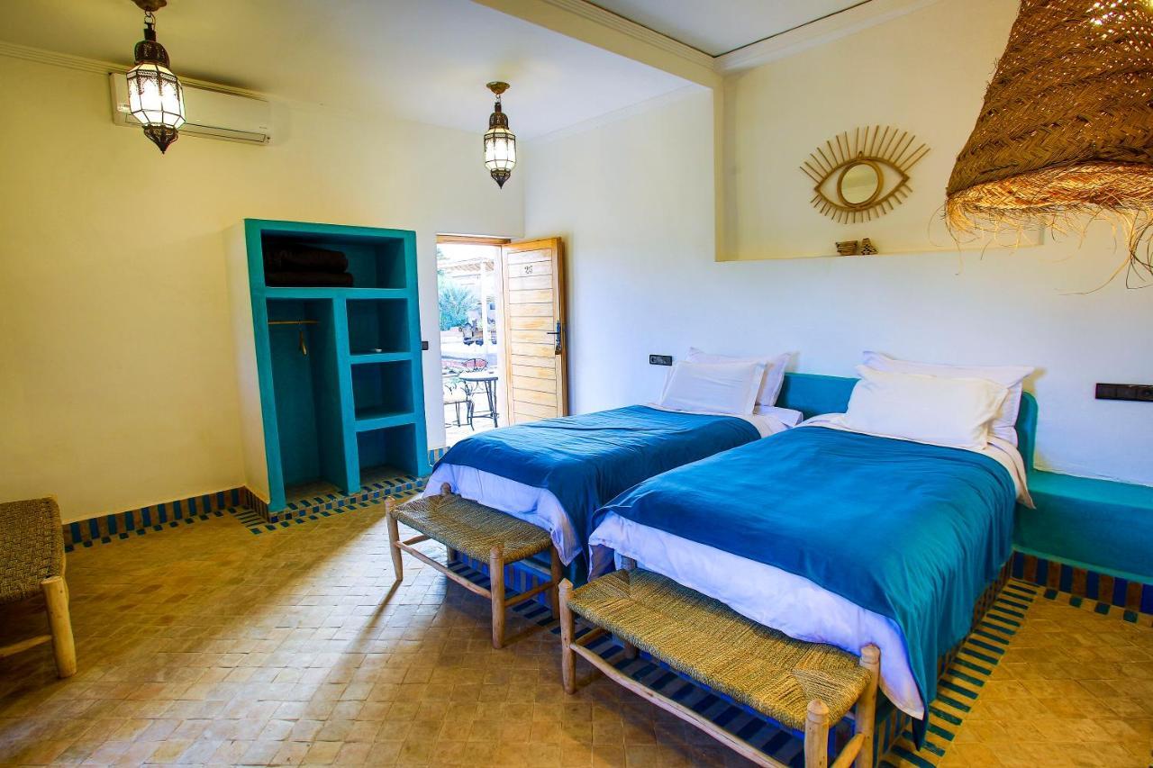Riadsuerteloca Merzouga Hassilabied エクステリア 写真 A bedroom at the hotel